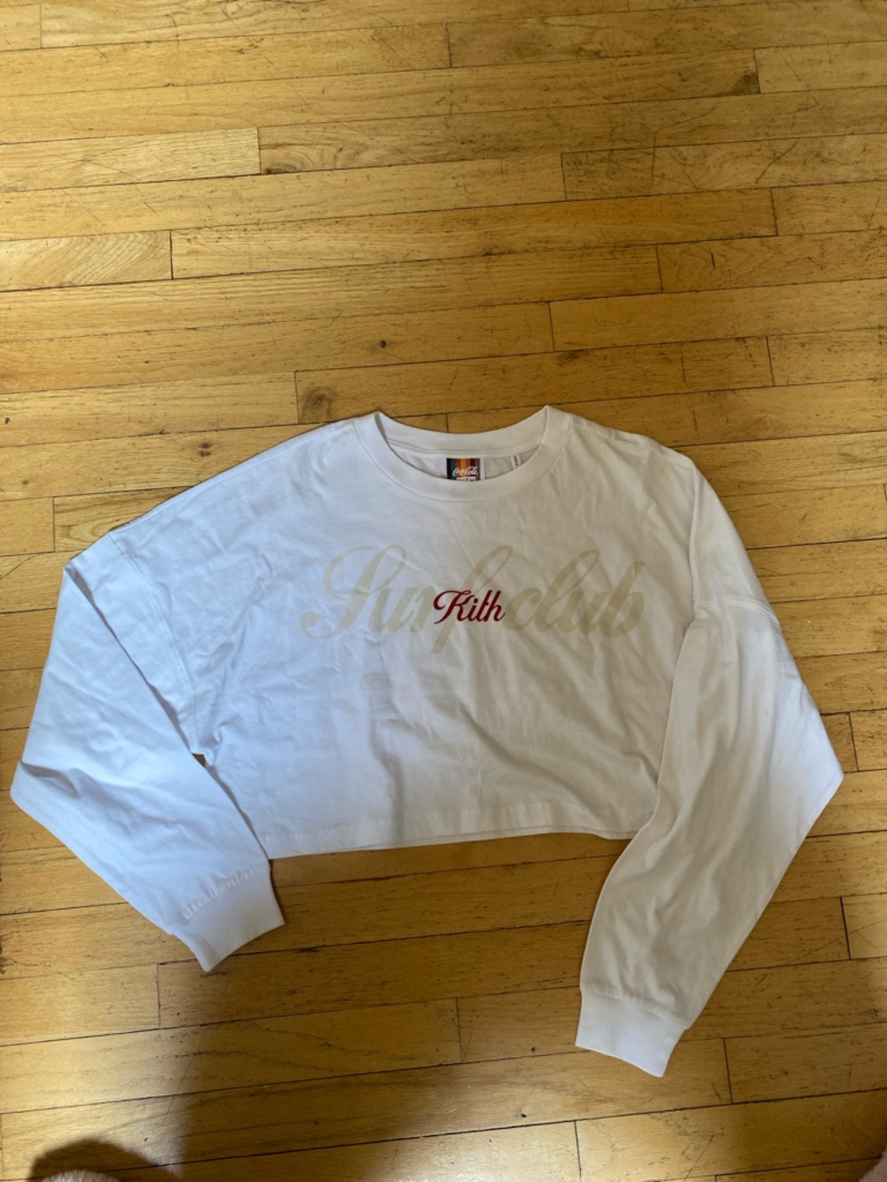 Kith coca-cola white crew  neck. Long sleeves. Size medium